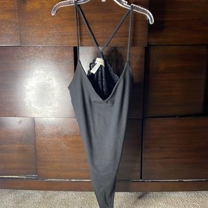 Black small laced back body suit from Discovery Clothing